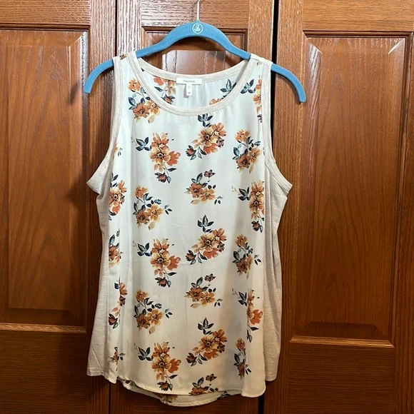 Maurice’s cream sheer tank. Never worn. Would need a cami underneath. - Picture 1 of 5